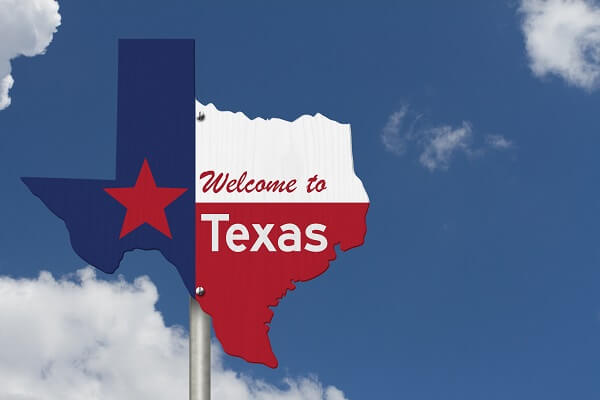 Picture of a flag in Texas state colors stating welcome to Texas